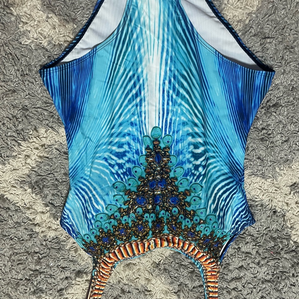 Never worn one piece swimsuit